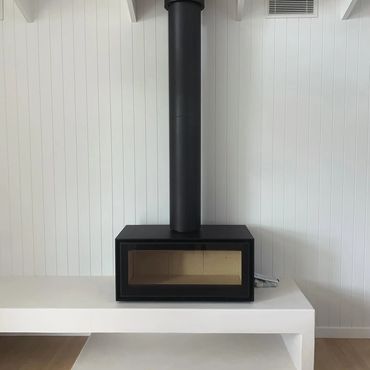 Castworks ADF clean modern wood fireplace free standing install on the Sunshine Coast.