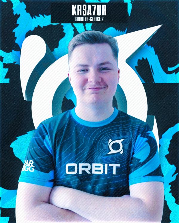 Portrait of a smiling esports player with arms crossed in an ORBIT jersey.