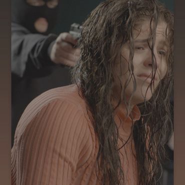 Courtney Lee Roberts held at gun point in "Again" short film