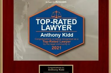 Award plaque honoring Anthony Kidd as a top-rated lawyer in 2021.