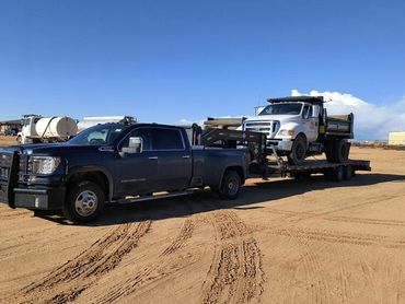 Hauling a 5 Yard Dump Truck