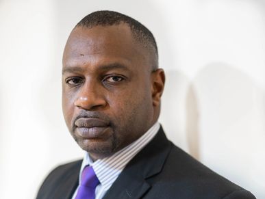 a man in a suit and a handkerchief