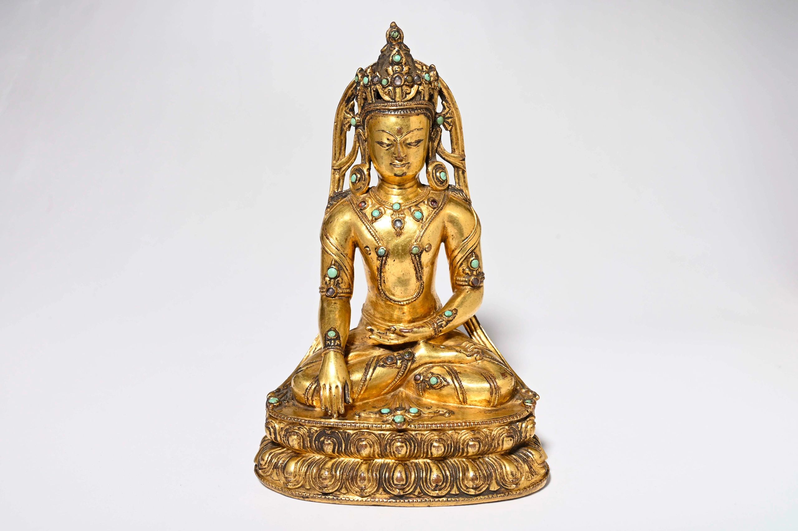 Tibet 14th century gilt copper Akshobhya Buddha 14cm Nyingjei Lam collection Hollywood Galleries 