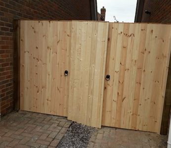 new wooden gates purpose built