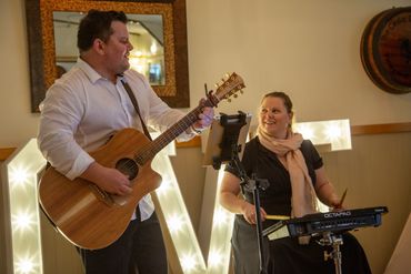Live duo acoustic music ensemble playing at a wedding in Tamborine Mountain