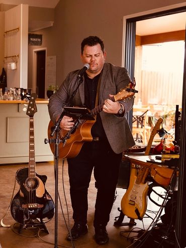 Byron Bay wedding with wedding singer entertaining guests