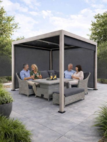 Four people enjoying drinks under a modern outdoor gazebo with wicker furniture.