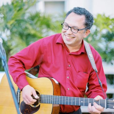 Michael playing at a wedding