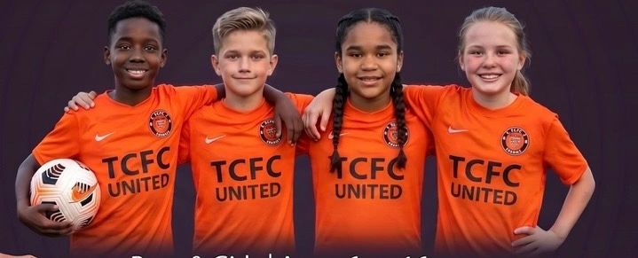 Four kids in orange TCFC United soccer jerseys smiling together.
