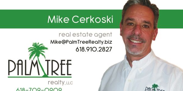 Business card of real estate agent Mike Cerkoski from Palm Tree Realty.