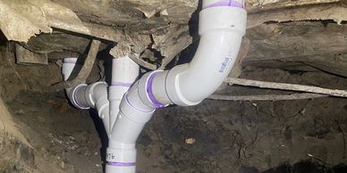 Sewer line repair crew working near Forney TX under slab