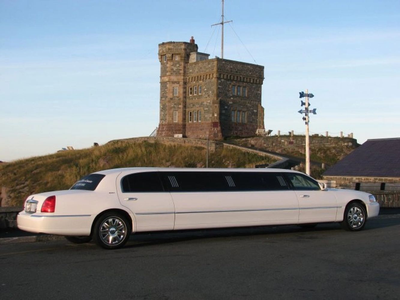 parked white limousine