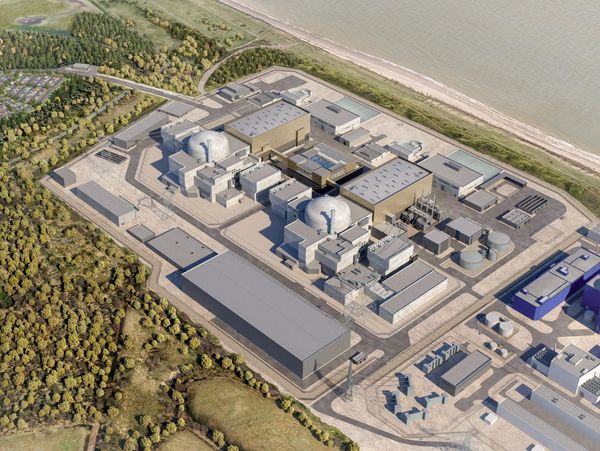 Aerial view of a coastal industrial facility with domed structures.