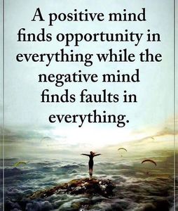 Inspirational quote about positive and negative mindsets with a serene ocean background.