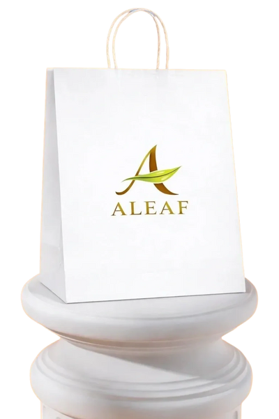 White shopping bag with ALEAF logo and green leaf design.