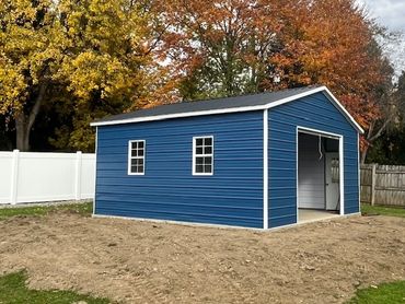 20x20x9 beautiful blue back yard metal building for storage, low-maintenance and portable in NY.