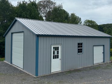 24x30x9 prefabricated storage building can also be used as a workshop or 2-stall garage in N.Y.