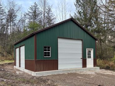 24x30x10 two tone detached steel structure,3 garage doors is near Frankfort,NY in Herkimer County.