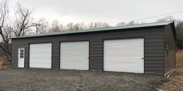 Prefab metal buildings are affordable this three door garage is weather resistant in Syracuse, N.Y.