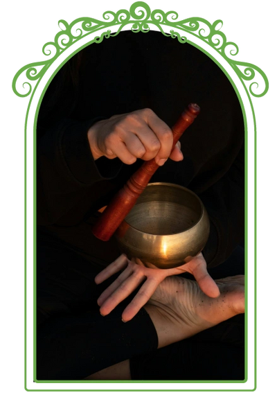 person making a singing bowl sing
