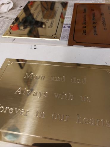 Engraved memorial plaque for parents.
