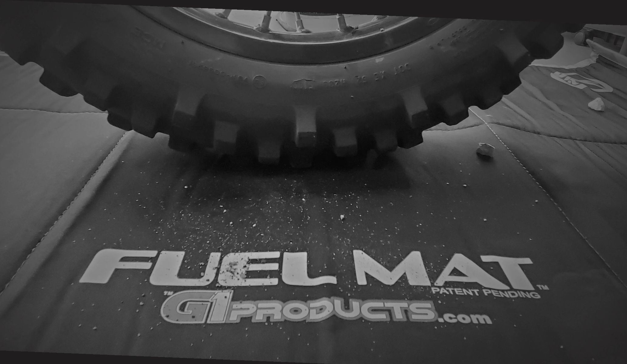 Fuel spill mat, MX on Fuel Mat, black and white