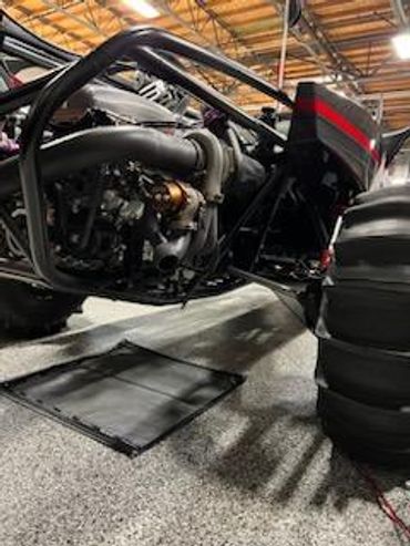 Storing buggy, storing vehicle, vehicle storage