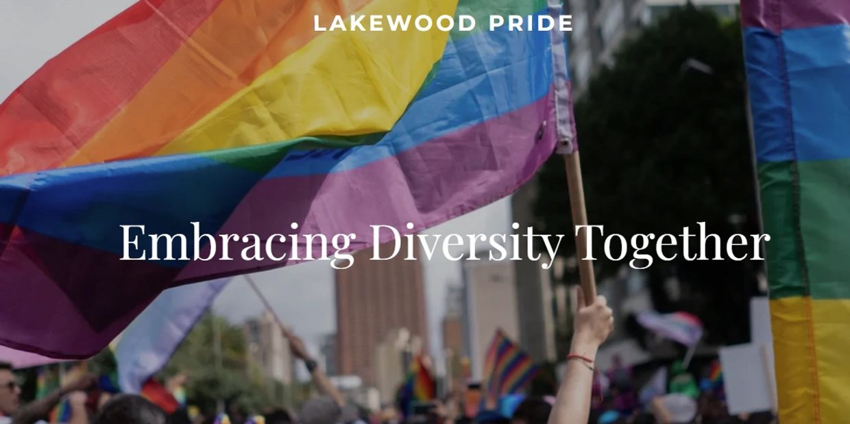 Colorful pride flags waving at Lakewood Pride event celebrating diversity.