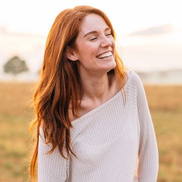 A woman smiles