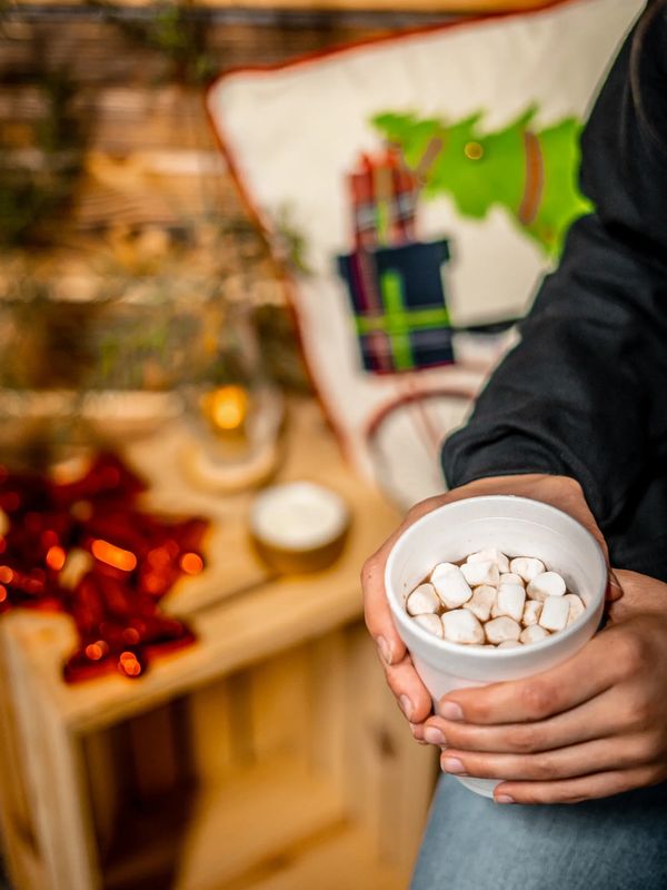 Hot chocolate in hands