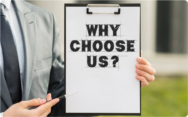 Person holding clipboard with text 'WHY CHOOSE US?'