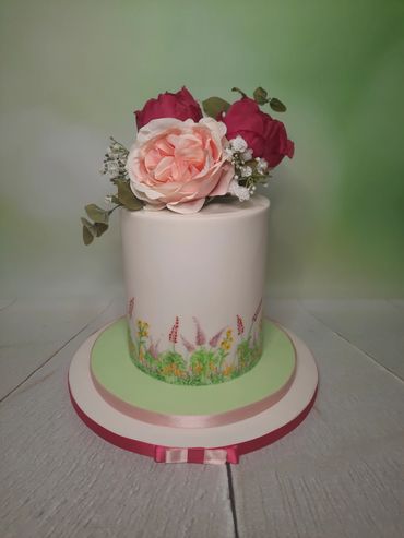 painted meadow cake with flowers