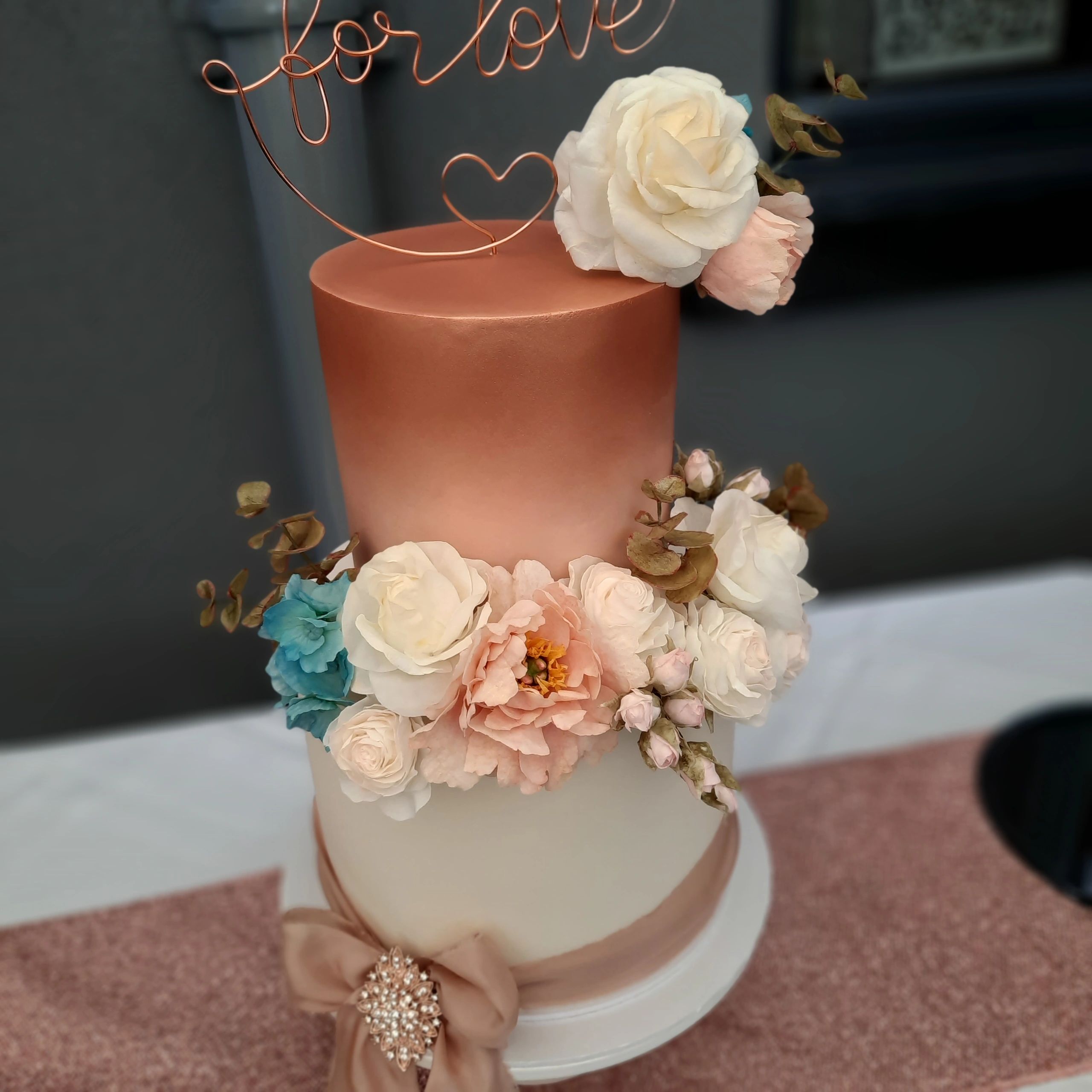 blush pink and rose gold 2 tier wedding cake