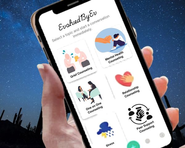 Hand holding phone displaying counseling app with various mental health options.