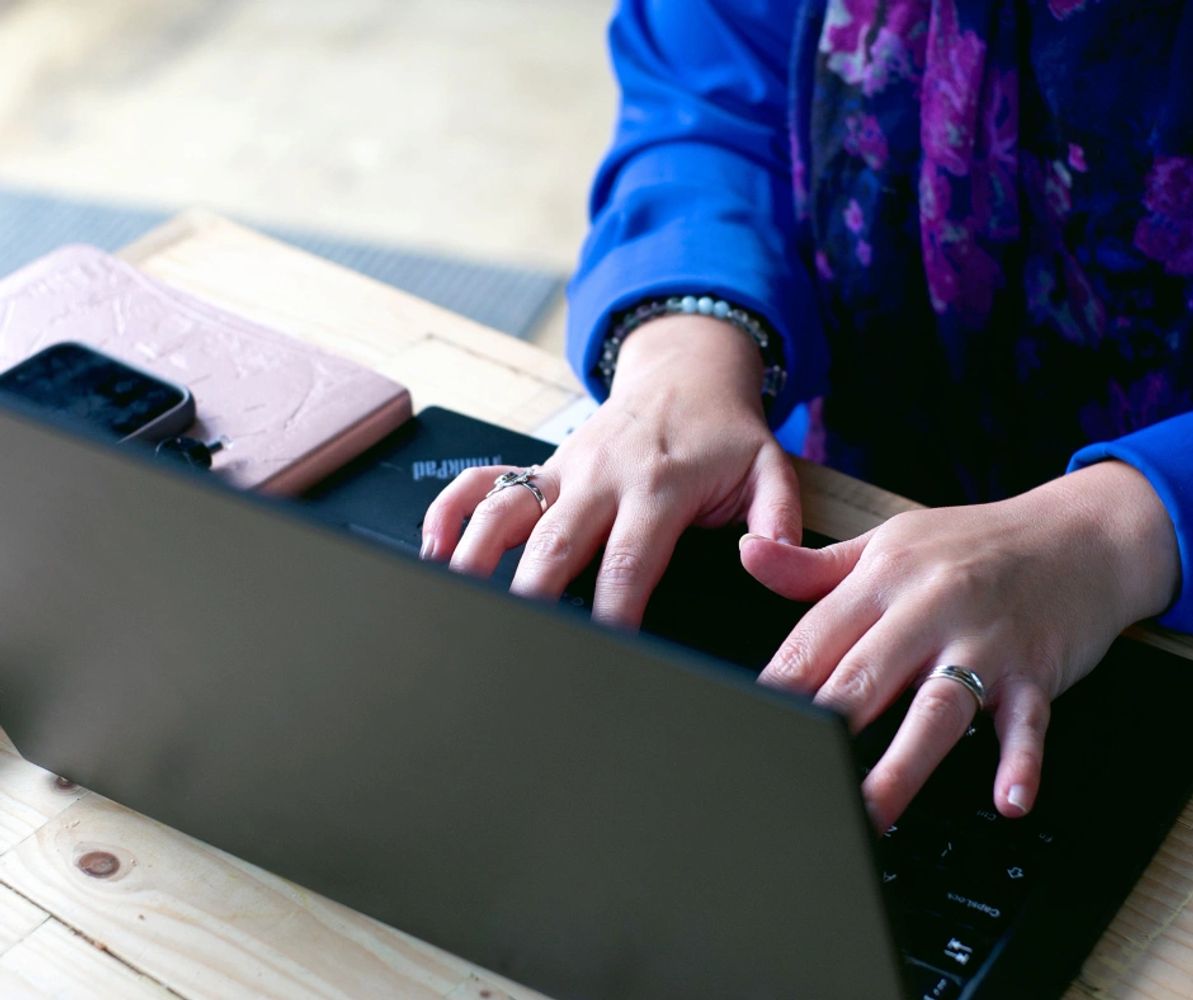 typing on laptop