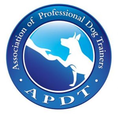 Logo of the Association of Professional Dog Trainers with a handshake symbol.