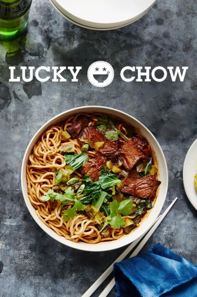 A bowl of beef noodle soup with greens from Lucky Chow.
