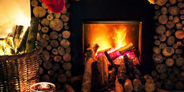Wood burning fireplace as primary heat source in cabin on Savary Island, BC near Powell River