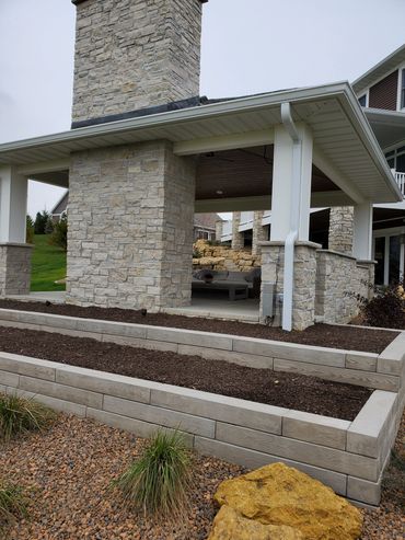 Landscape Contractor with Patios, Landscape Plantings, Retaining Walls, Firepits, Planters, Lights