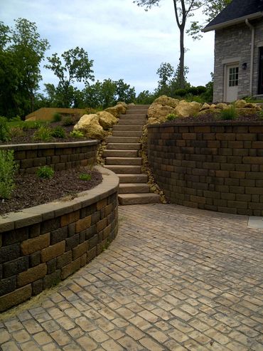 Retaining Walls, Fire pits, Landscape Lighting, Pruning, Fencing, Privacy Screens, Outdoor fireplace