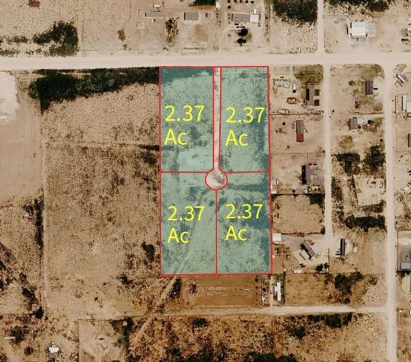 Aerial view of four 2.37-acre land plots.