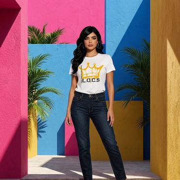 Woman standing confidently in colorful geometric background wearing casual outfit.