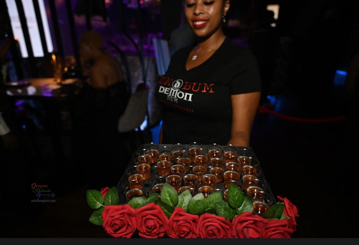 Crafted cocktails made with Saki and topped with embellished flowers for a Japanese artist showing.
