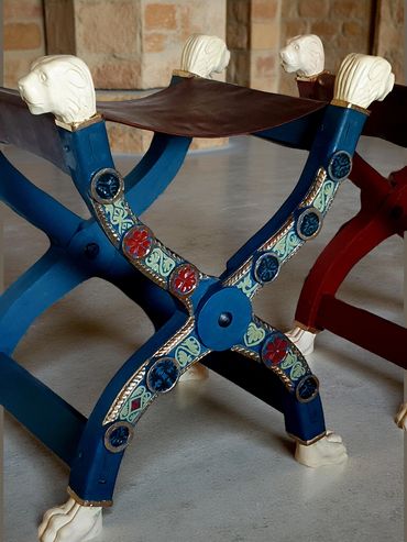 Sella curulis inspired chair built for Norwich Castle. With carved faux ivory feet and heads.