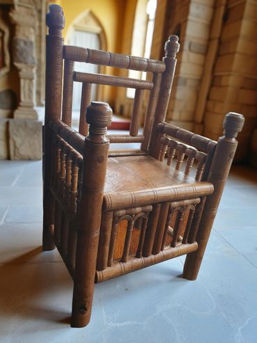 Turned chair for Norwich Castle crafted from Oak. Based on King Stephen's chair in Hereford Cathedra
