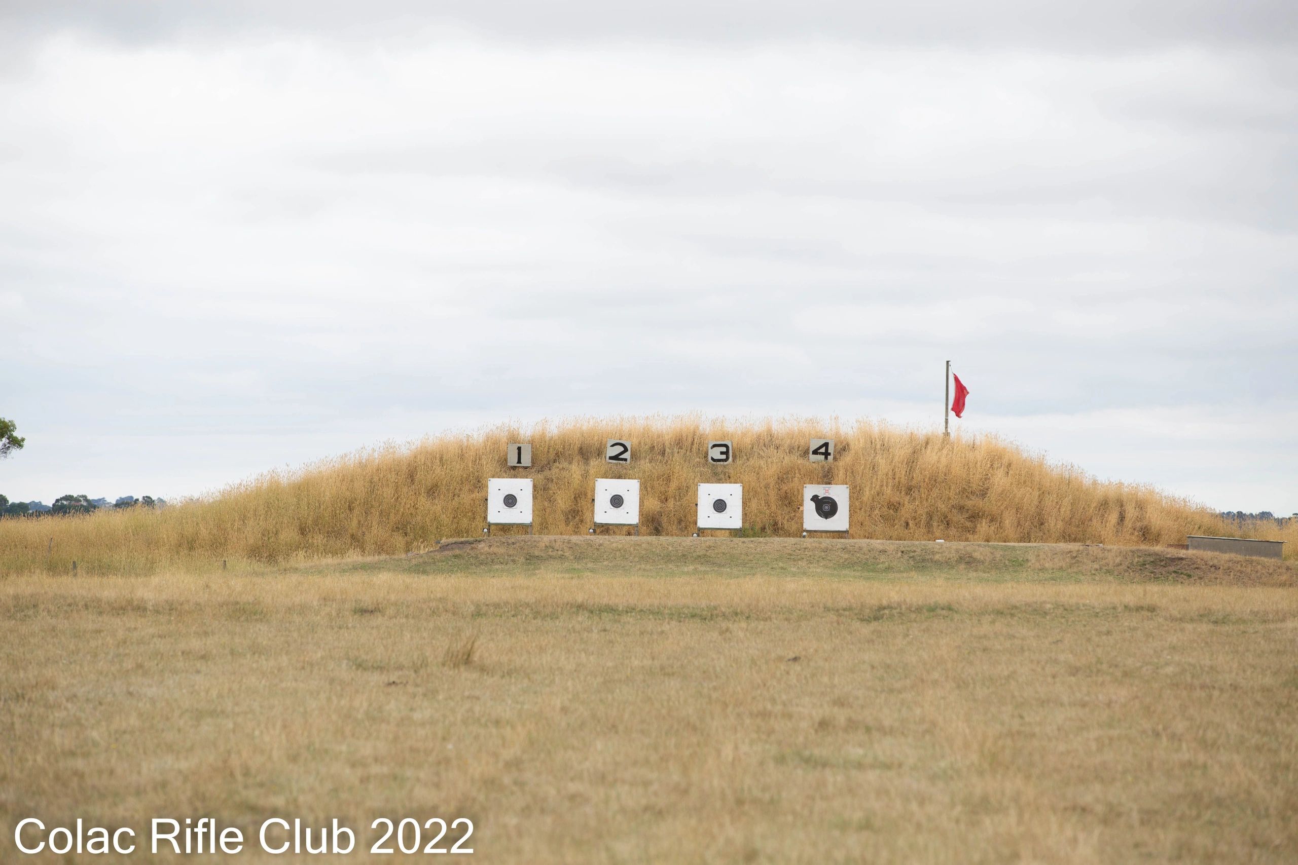 Image of 4 electronic targets with stop butts and Lake Colac in the background