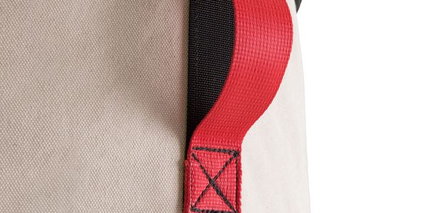 Special color side grab handles on canvas lift bag.