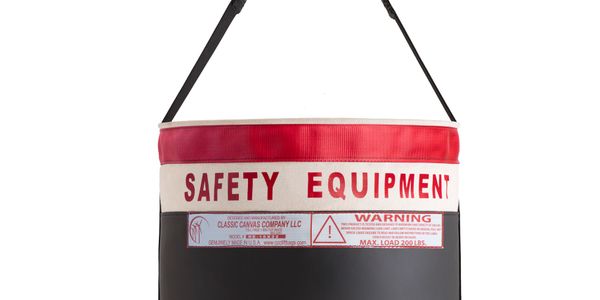 Safety Equipment Bag specially marked in fire engine red color for easy identification.