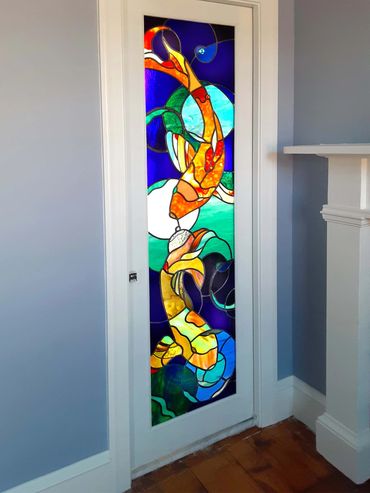 Stained glass pocket door 