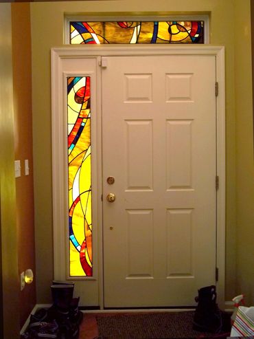 Colorful stained glass sidelight and transom ideas colorful Stained Glass privacy glass for doors
